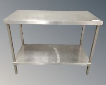 A commercial stainless steel two-tier prep table, width 120 cm.