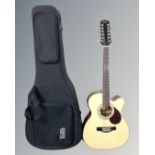 An Adam Black model 0-5CE-12/N 12-string semi-acoustic guitar in carry case