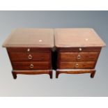 A pair of Stag Minstrel two drawer beside chests with slides