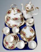 A tray containing twenty-one pieces of Royal Albert Old Country Roses tea and dinner china.