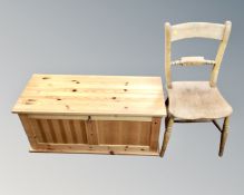 An antique pine farmhouse kitchen chair together with a pine blanket box