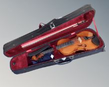 A Westbury full size violin and bow with accessories in carry case