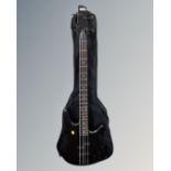 A Gio Ibanez Soundgear electric bass guitar in carry bag