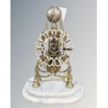 A 19th century and later skeleton clock on marble plinth,