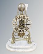 A 19th century and later skeleton clock on marble plinth,