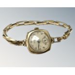A lady's 9ct gold wristwatch on 9ct gold expansion strap CONDITION REPORT: 16.