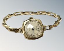 A lady's 9ct gold wristwatch on 9ct gold expansion strap CONDITION REPORT: 16.