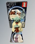 A Lego Star Wars 7194 Yoda with instructions and box.