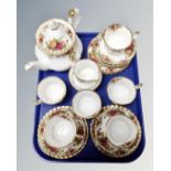 A tray containing twenty-one pieces of Royal Albert Old Country Roses tea china.