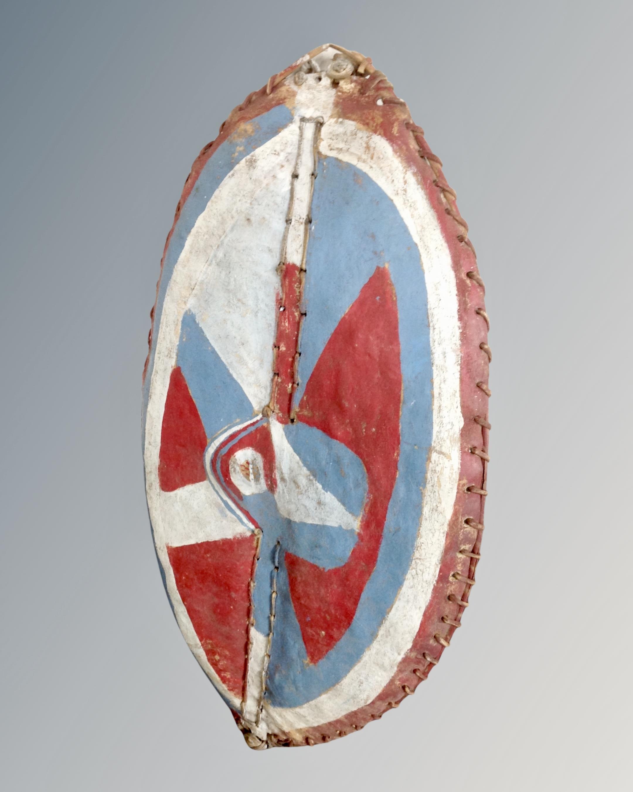 A hand-painted tribal shield,