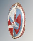 A hand-painted tribal shield,