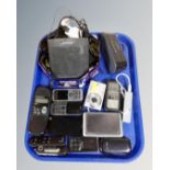 A tray containing various electricals and mobile phones including Bose Soundlink speaker,