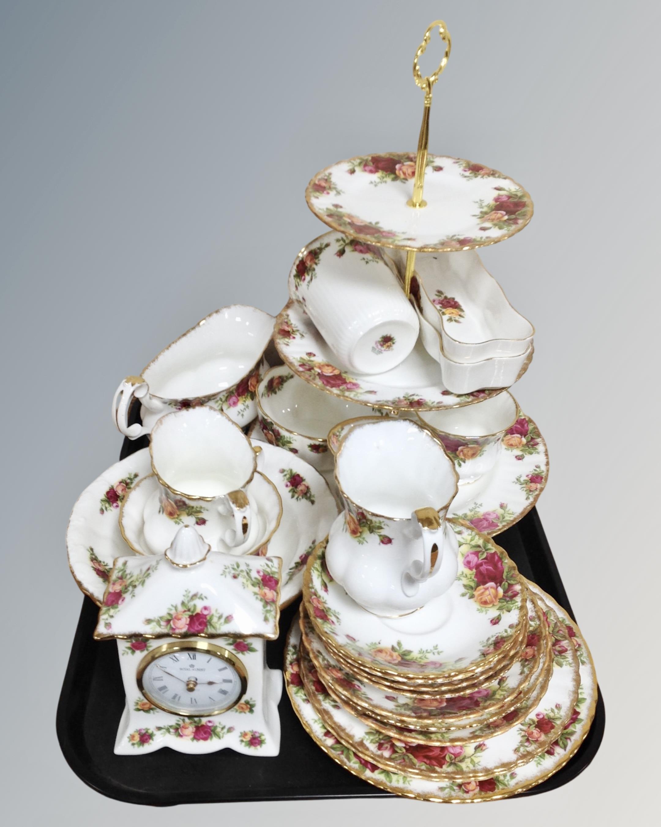 A tray containing 21 pieces of Royal Albert Old Country Roses tea and dinner china,