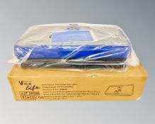 A Vibrapower vibration plate in box.