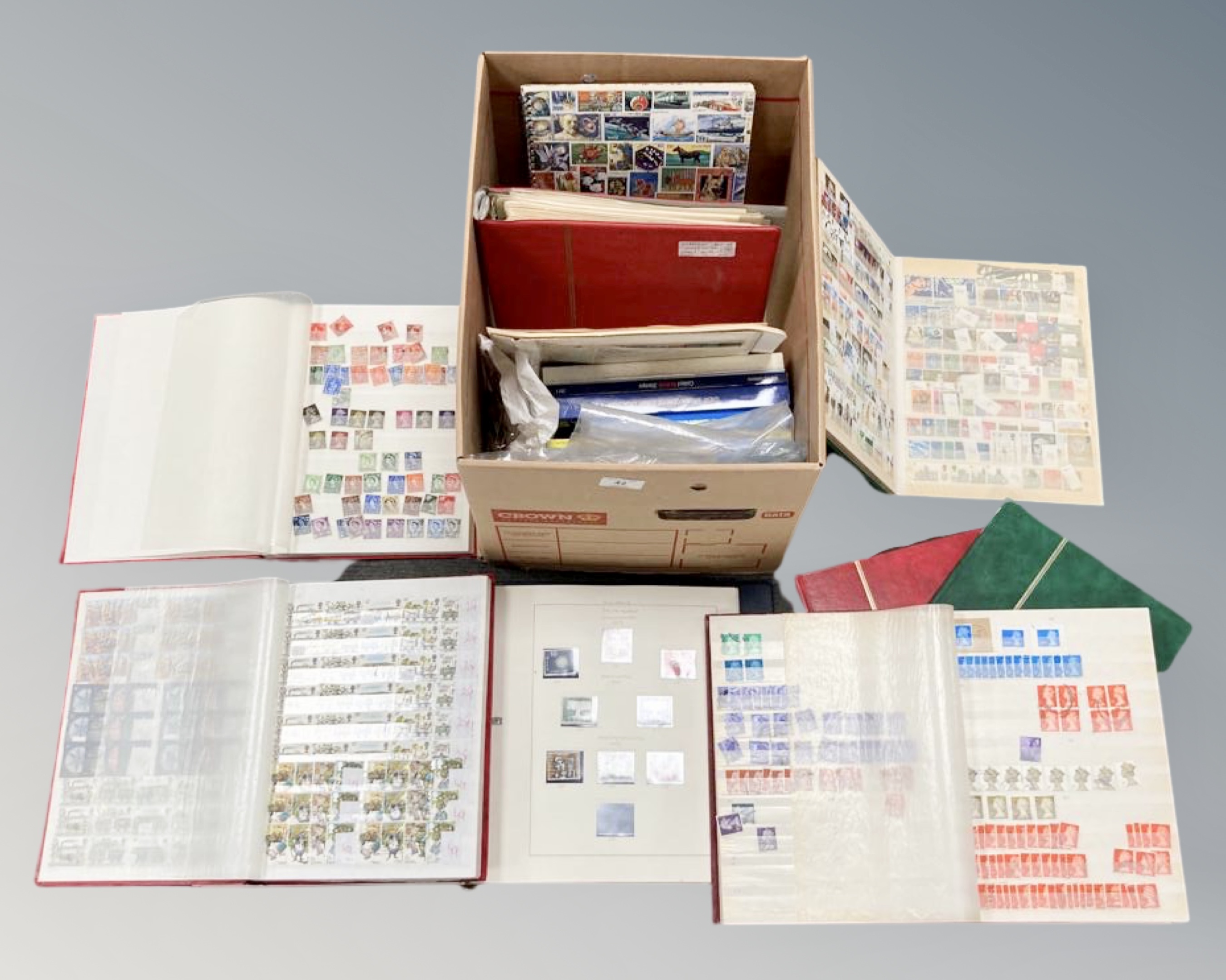 A box of stamps albums,