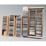 Five stands containing a quantity of CD's,