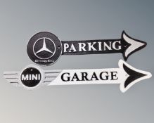 Two cast iron arrow plaques, Mercedes Benz parking and Mini garage.