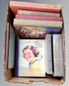 A box of vintage books, children's annuals, The Constance Spry Cookery Book,