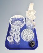 A tray containing assorted glassware including Wedgwood paperweight, whiskey and liqueur decanters,