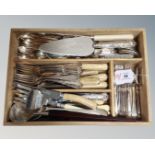 A wooden four-compartment cutlery tray containing a quantity of various silver plated table ware :