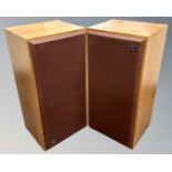 A pair of teak cased Ram speakers with stands and cables