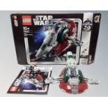 A Lego Star Wars 75243 Slave I 20th Anniversary edition with mini-figures, box and instructions.