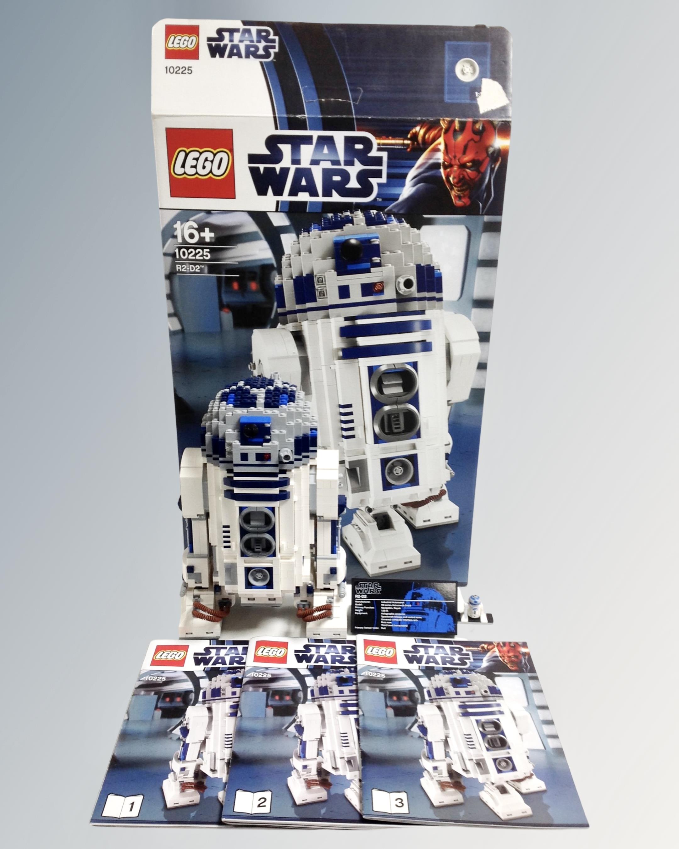A Lego Star Wars 10225 R2-D2 with box and instructions.