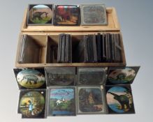 A box of Victorian coloured glass slides