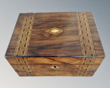 A Victorian walnut marquetry inlaid sewing/writing box with contents.