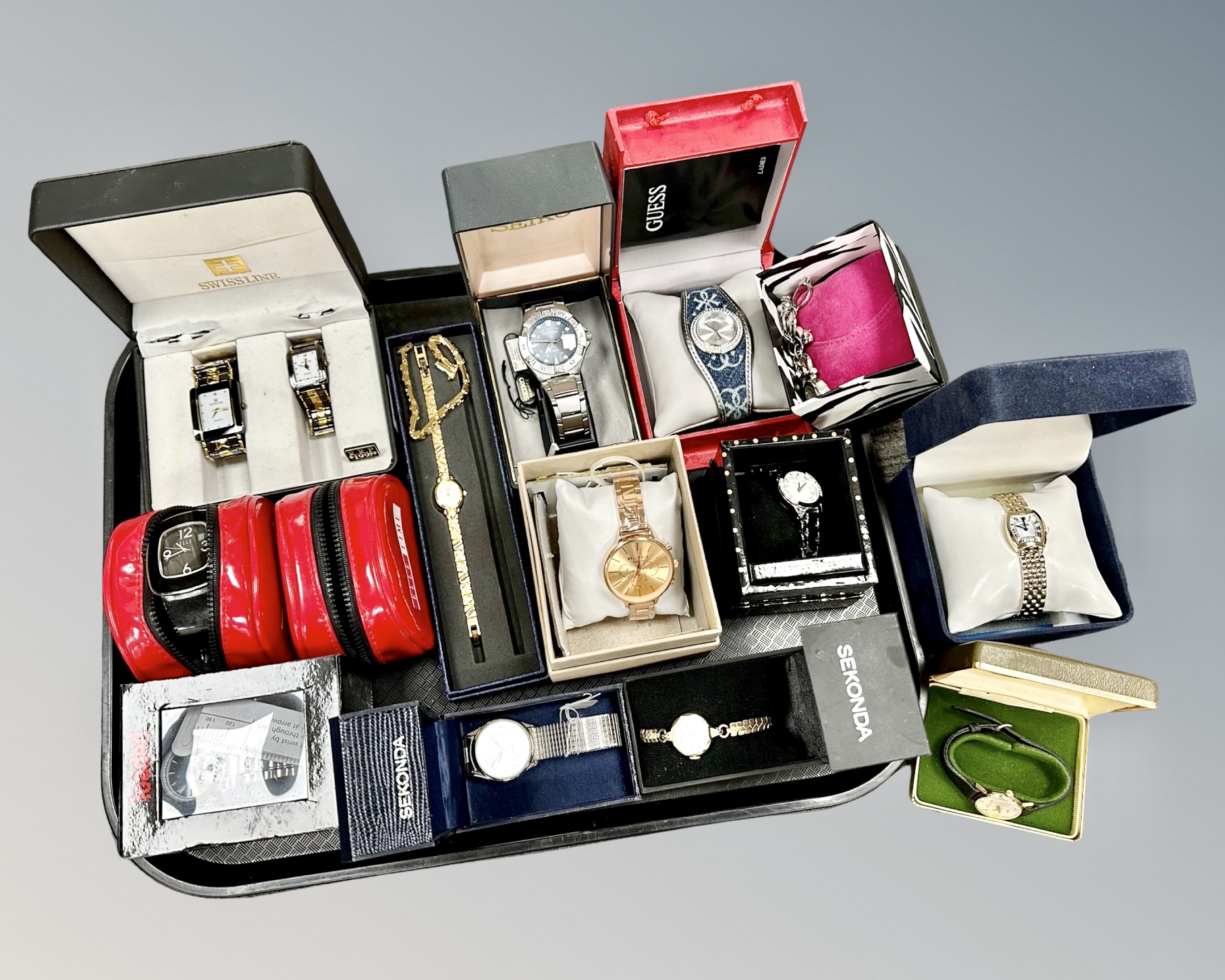 A quantity of boxed lady's and gent's dress watches including Seiko, Sekonda,