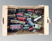 A box of a quantity of vintage tin plate rolling stock