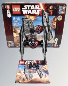 A Lego Star Wars 75101 First Order Special Forces Tie-Fighter with mini-figures,