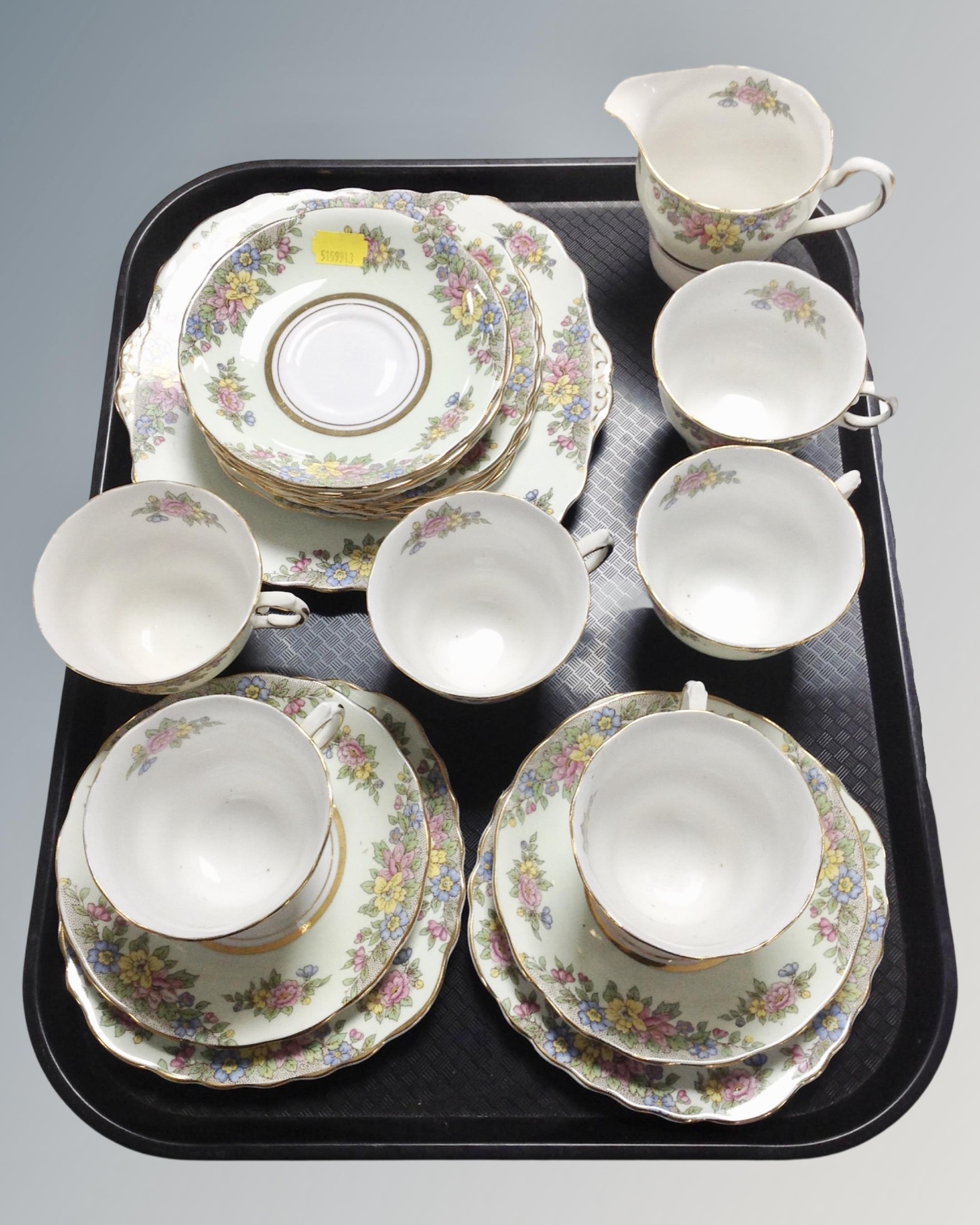 A 20 piece Colclough floral patterned bone china tea service.