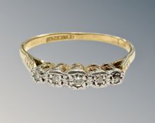 An 18ct gold and platinum five stone diamond ring, size Q1/2. CONDITION REPORT: 2.