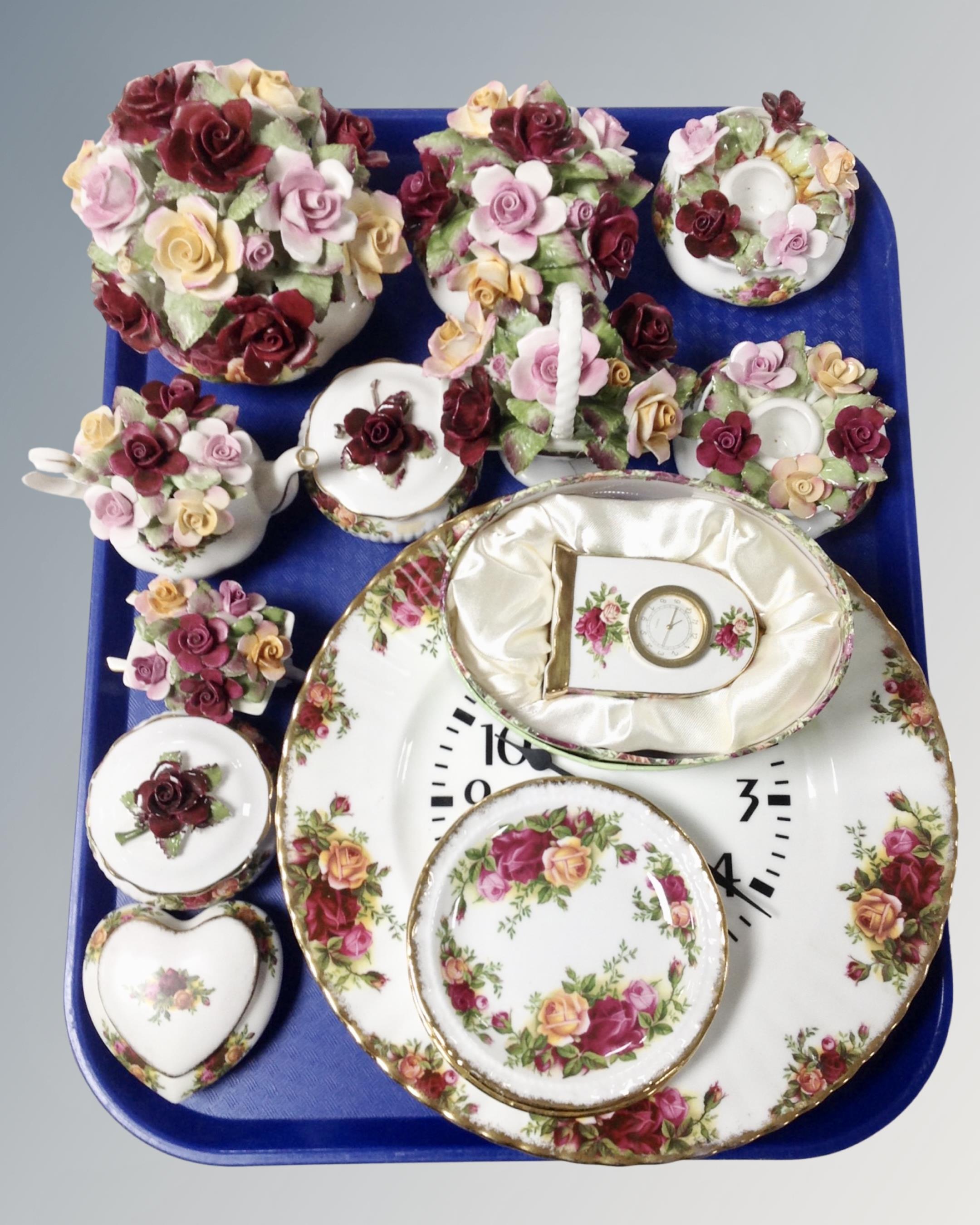 A tray containing fourteen pieces of Royal Albert Old Country Roses cabinet china including wall