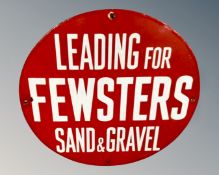 A circular enamelled sign Leading for Fewsters Sand & Gravel,