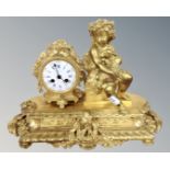A 19th century French ornate figural ormolu mantel clock, retailed by A.