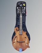 A Barnes & Mullins of London Salvino 8-string mandolin in carry bag
