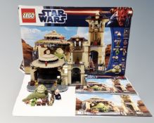 A Lego Star Wars 9516 Jabba's Palace with mini-figures, box and instructions.