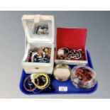 A tray containing a collection of costume jewellery including glass necklaces,