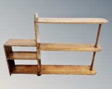 A set of 20th century oak open step shelves