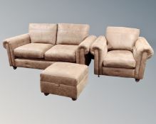A contemporary brown suede upholstered two seater settee,