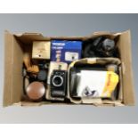 A box of Sony Cybershot digital camera in bag, boxed Nikon F-401s camera body, Kodak photo printer,