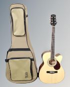 An Adam Black model 0-5CE semi-acoustic guitar in carry case