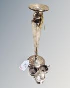 Six pieces of silver : a loaded candlestick height 28 cm, a pair of salts,
