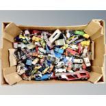 A box containing a large quantity of 20th century play-worn die cast vehicles including Corgi,