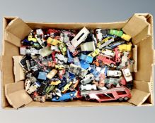 A box containing a large quantity of 20th century play-worn die cast vehicles including Corgi,
