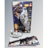 A Lego Star Wars 75055 Imperial Star Destroyer with mini-figures, box and instructions.