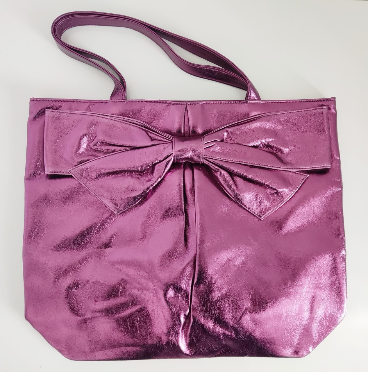 Nina Ricci shopping bag: shimmering carrier with popper fastening, detailed with a large bow. - Image 3 of 5