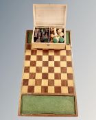 A large vintage chess set in box together with inlaid board, king 8 cm.